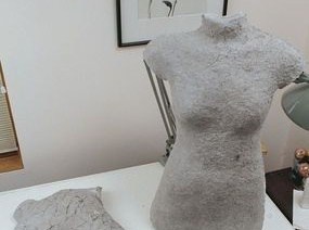 A picture of a dress form in progress