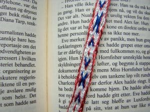 X and arrows tablet-woven bookmark close-up